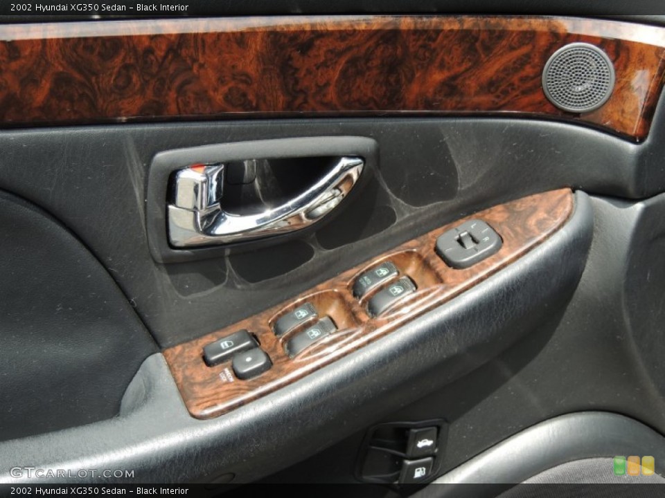 Black Interior Controls for the 2002 Hyundai XG350 Sedan #81305468