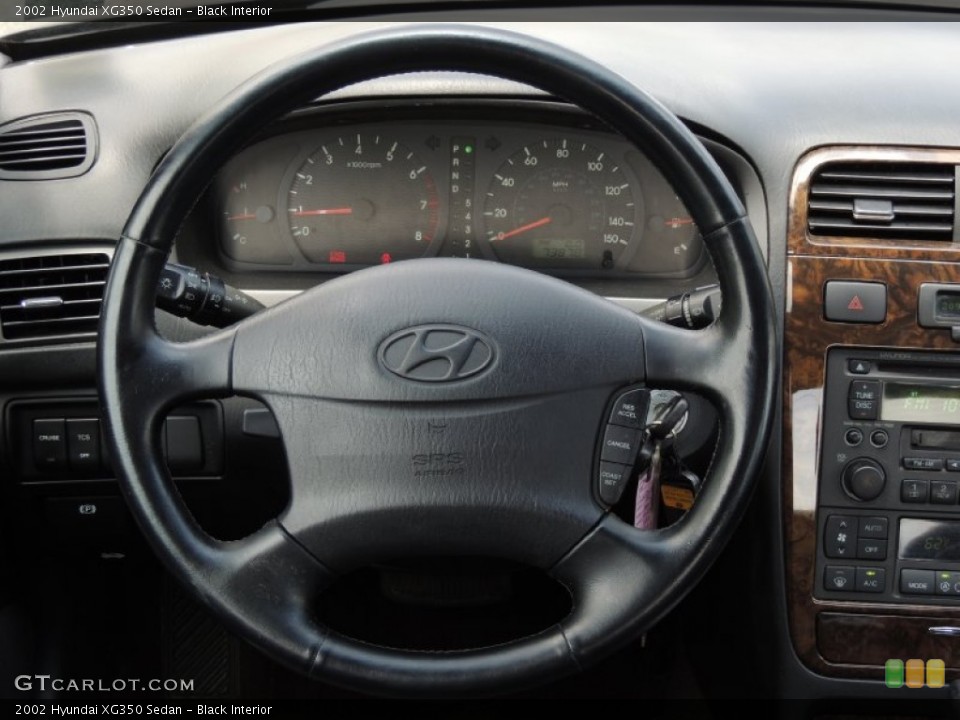 Black Interior Steering Wheel for the 2002 Hyundai XG350 Sedan #81305546