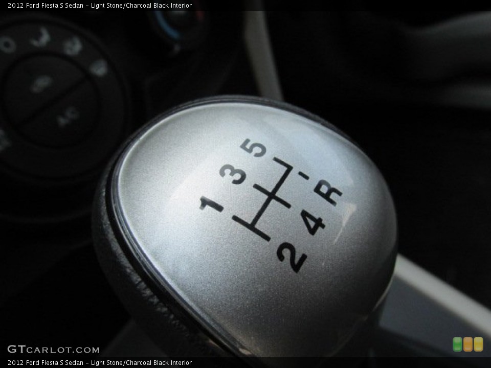 Light Stone/Charcoal Black Interior Transmission for the 2012 Ford Fiesta S Sedan #81314726