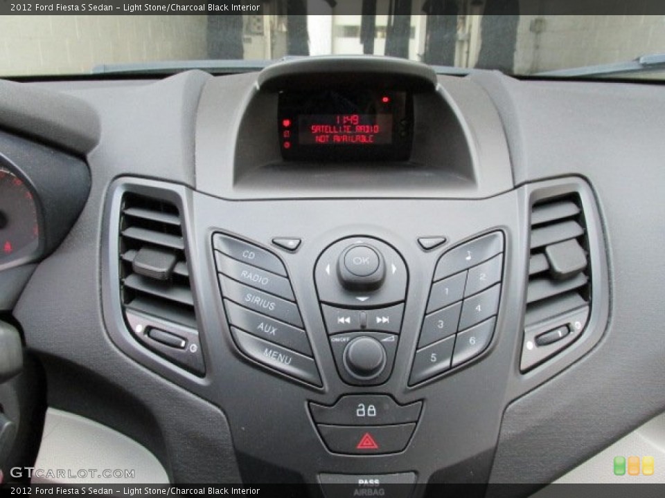 Light Stone/Charcoal Black Interior Controls for the 2012 Ford Fiesta S Sedan #81314750