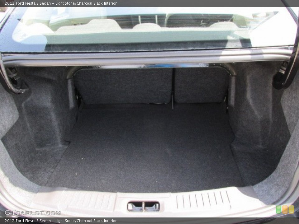 Light Stone/Charcoal Black Interior Trunk for the 2012 Ford Fiesta S Sedan #81314890