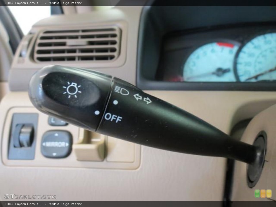 Pebble Beige Interior Controls for the 2004 Toyota Corolla LE #81333812