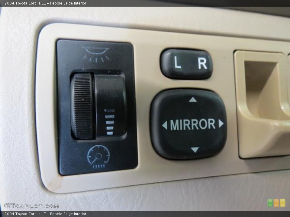 Pebble Beige Interior Controls for the 2004 Toyota Corolla LE #81333857