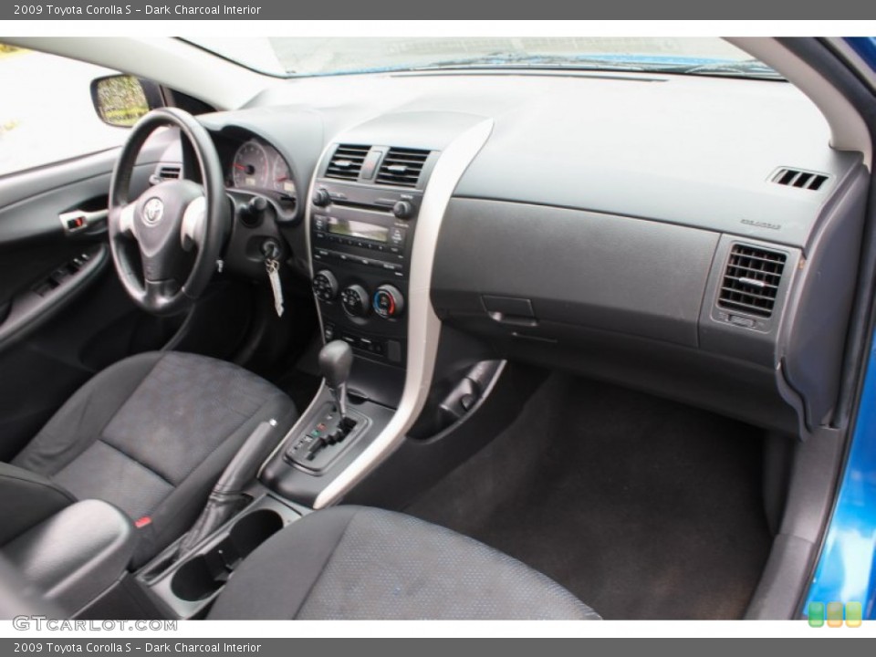Dark Charcoal Interior Dashboard for the 2009 Toyota Corolla S #81349737