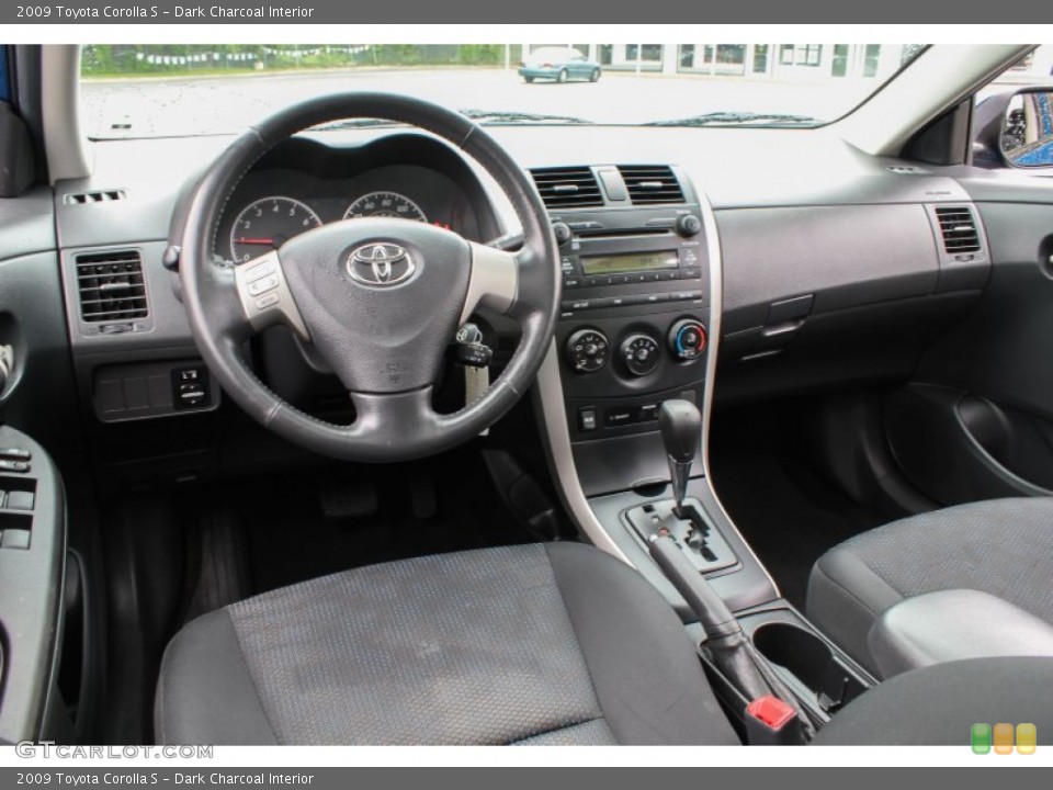 Dark Charcoal Interior Dashboard for the 2009 Toyota Corolla S #81349887