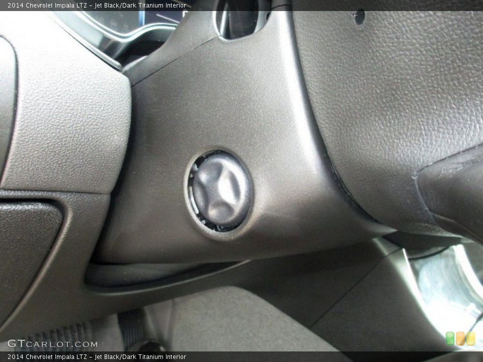 Jet Black/Dark Titanium Interior Controls for the 2014 Chevrolet Impala LTZ #81353057