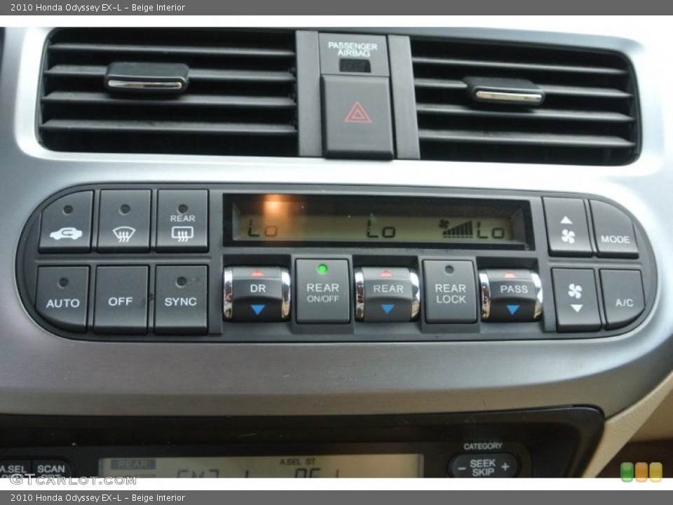 Beige Interior Controls for the 2010 Honda Odyssey EX-L #81375075
