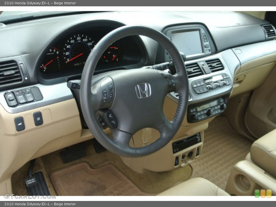Beige Interior Dashboard for the 2010 Honda Odyssey EX-L #81375339