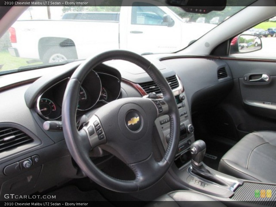 Ebony Interior Steering Wheel for the 2010 Chevrolet Malibu LTZ Sedan #81378873