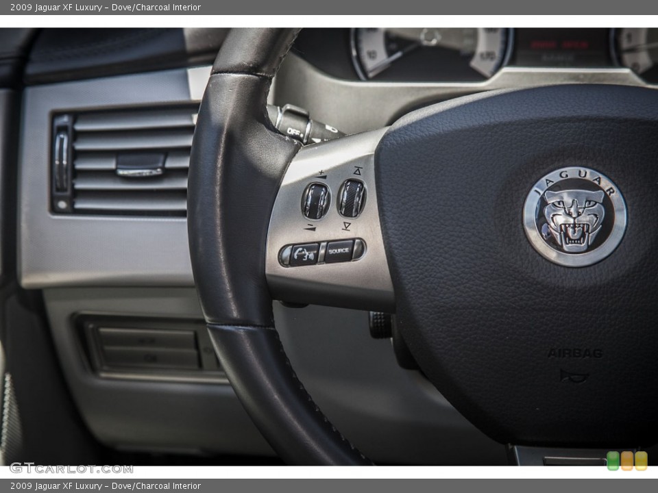 Dove/Charcoal Interior Controls for the 2009 Jaguar XF Luxury #81388674