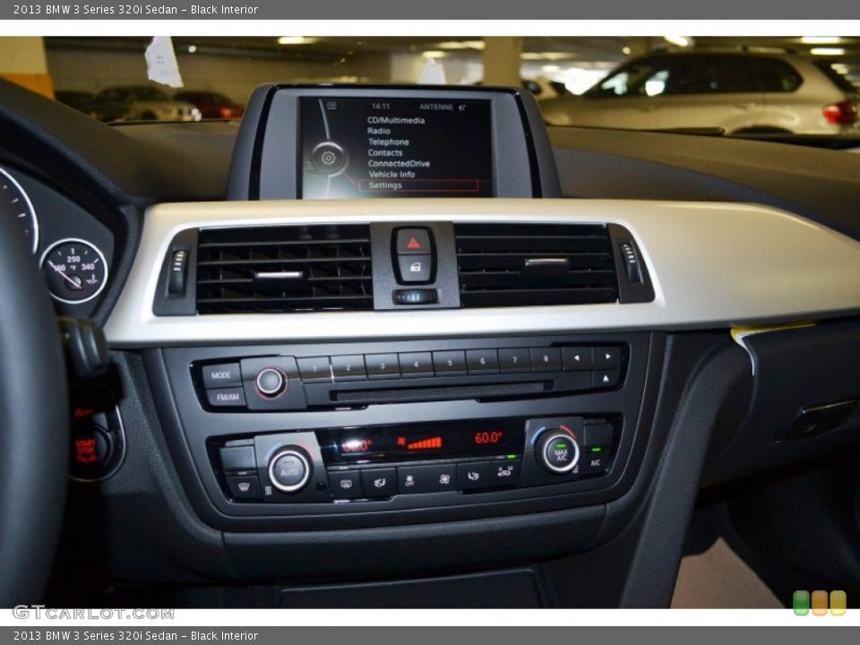 Black Interior Controls for the 2013 BMW 3 Series 320i Sedan #81402885