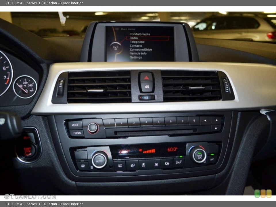 Black Interior Controls for the 2013 BMW 3 Series 320i Sedan #81402912