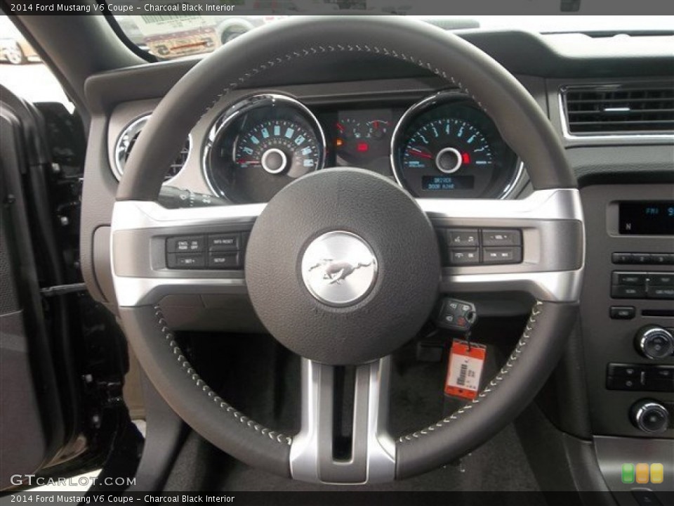 Charcoal Black Interior Steering Wheel for the 2014 Ford Mustang V6 Coupe #81425992