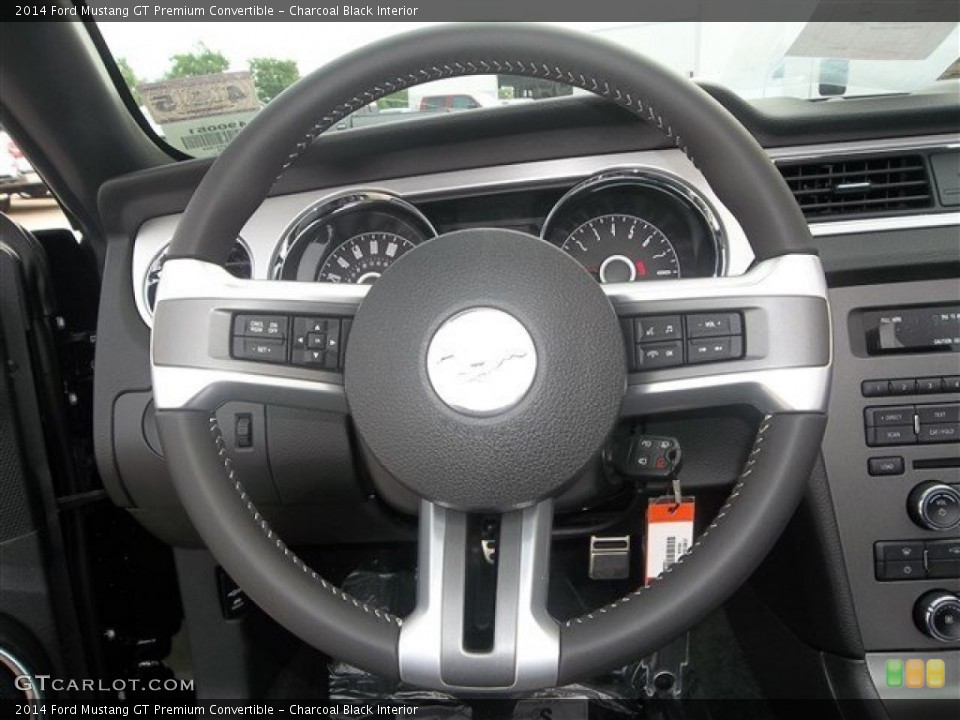 Charcoal Black Interior Steering Wheel for the 2014 Ford Mustang GT Premium Convertible #81426579