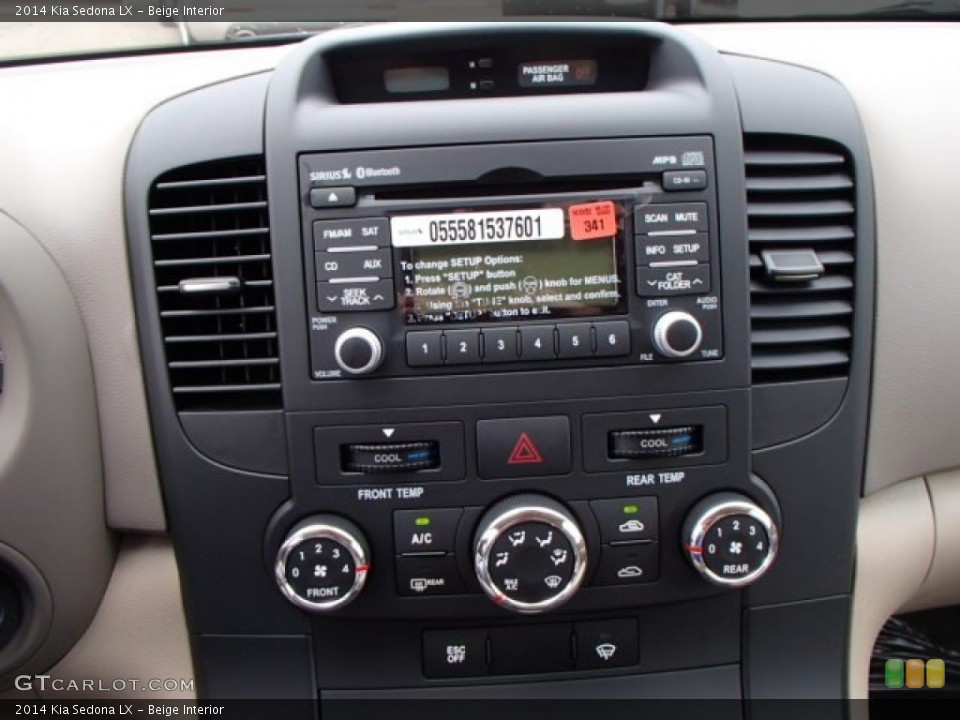 Beige Interior Controls for the 2014 Kia Sedona LX #81430380
