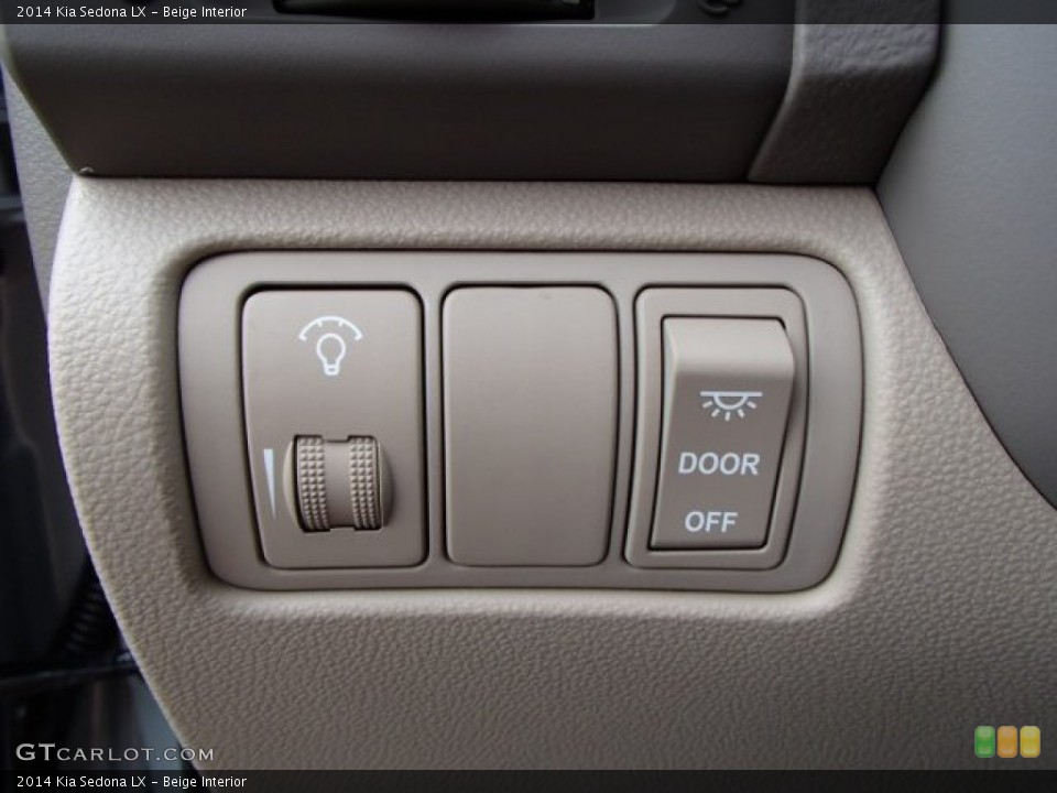 Beige Interior Controls for the 2014 Kia Sedona LX #81430434