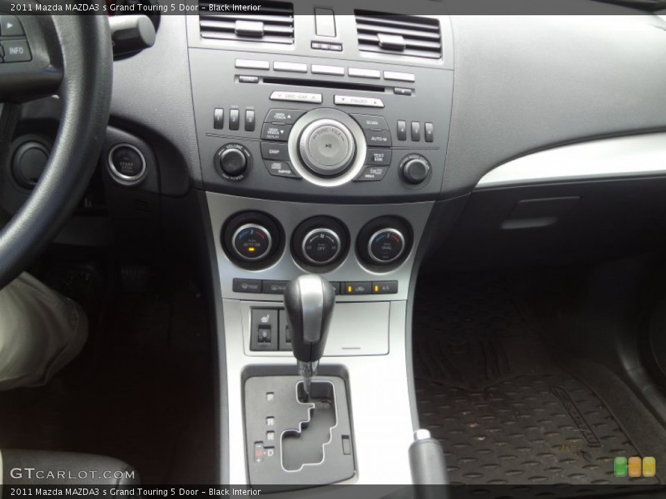 Black Interior Controls for the 2011 Mazda MAZDA3 s Grand Touring 5 Door #81436446
