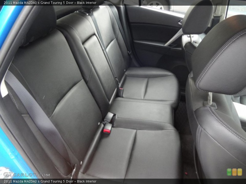 Black Interior Rear Seat for the 2011 Mazda MAZDA3 s Grand Touring 5 Door #81436510