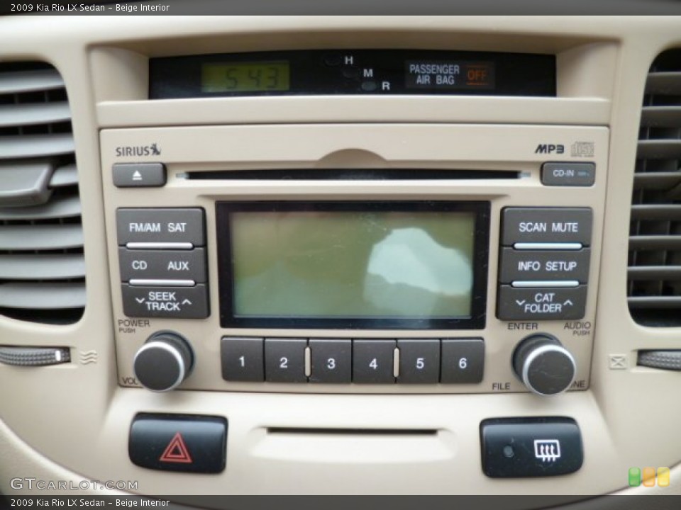 Beige Interior Audio System for the 2009 Kia Rio LX Sedan #81458359