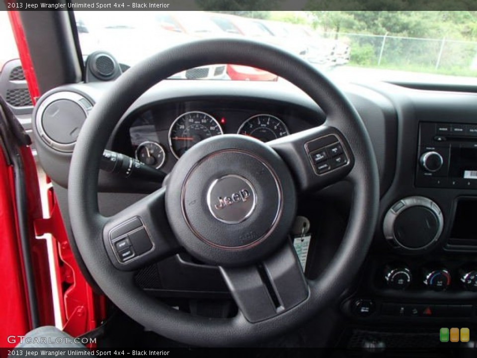 Black Interior Steering Wheel for the 2013 Jeep Wrangler Unlimited Sport 4x4 #81470340