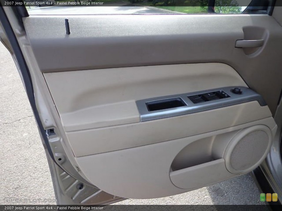 Pastel Pebble Beige Interior Door Panel for the 2007 Jeep Patriot Sport 4x4 #81475908