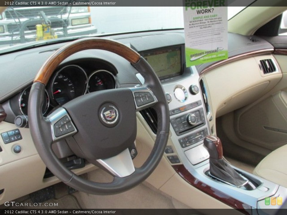 Cashmere/Cocoa Interior Dashboard for the 2012 Cadillac CTS 4 3.0 AWD Sedan #81486996