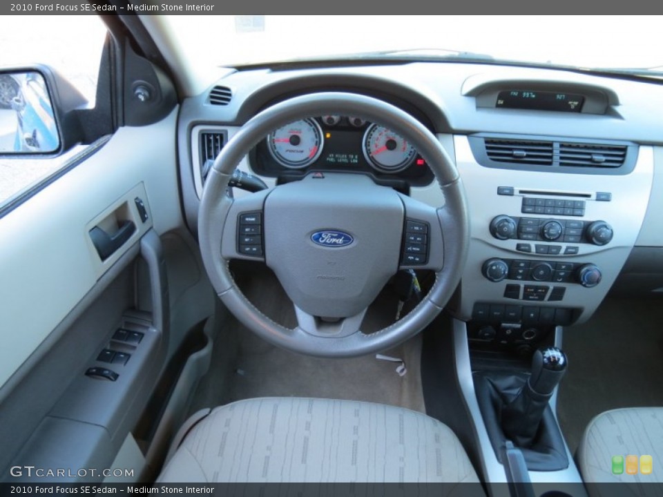 Medium Stone Interior Dashboard for the 2010 Ford Focus SE Sedan #81497595