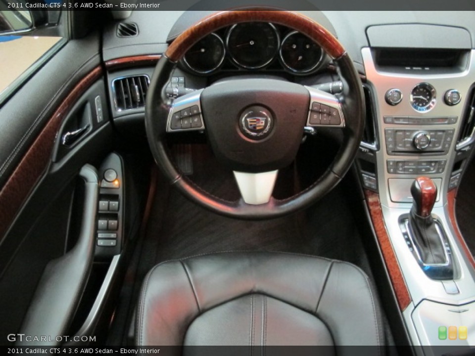 Ebony Interior Dashboard for the 2011 Cadillac CTS 4 3.6 AWD Sedan #81518994