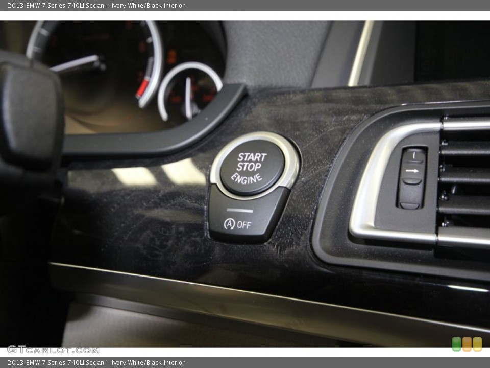 Ivory White/Black Interior Controls for the 2013 BMW 7 Series 740Li Sedan #81537842
