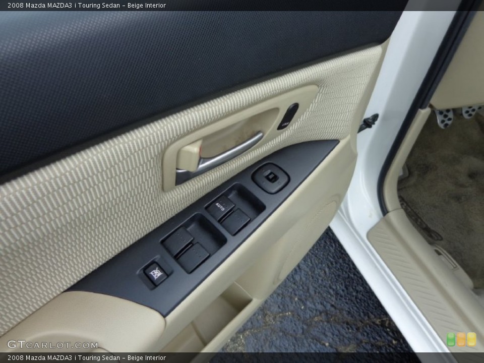 Beige Interior Controls for the 2008 Mazda MAZDA3 i Touring Sedan #81552719
