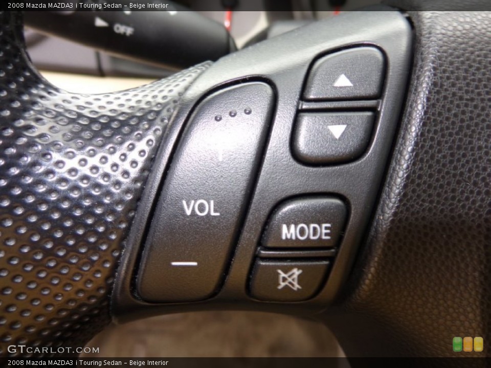 Beige Interior Controls for the 2008 Mazda MAZDA3 i Touring Sedan #81552813