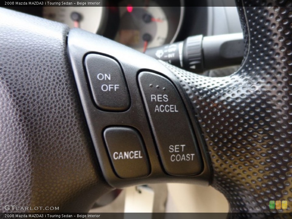Beige Interior Controls for the 2008 Mazda MAZDA3 i Touring Sedan #81552836