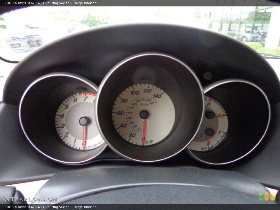 Beige Interior Gauges for the 2008 Mazda MAZDA3 i Touring Sedan #81552858