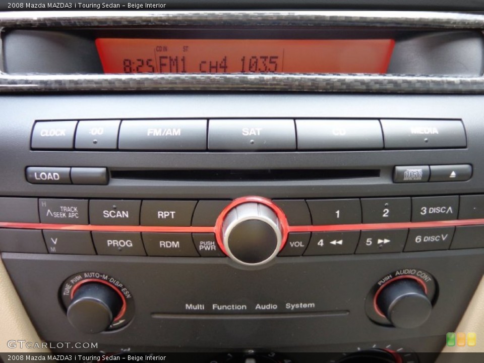 Beige Interior Audio System for the 2008 Mazda MAZDA3 i Touring Sedan #81552948