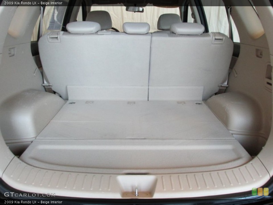 Beige Interior Trunk for the 2009 Kia Rondo LX #81563628