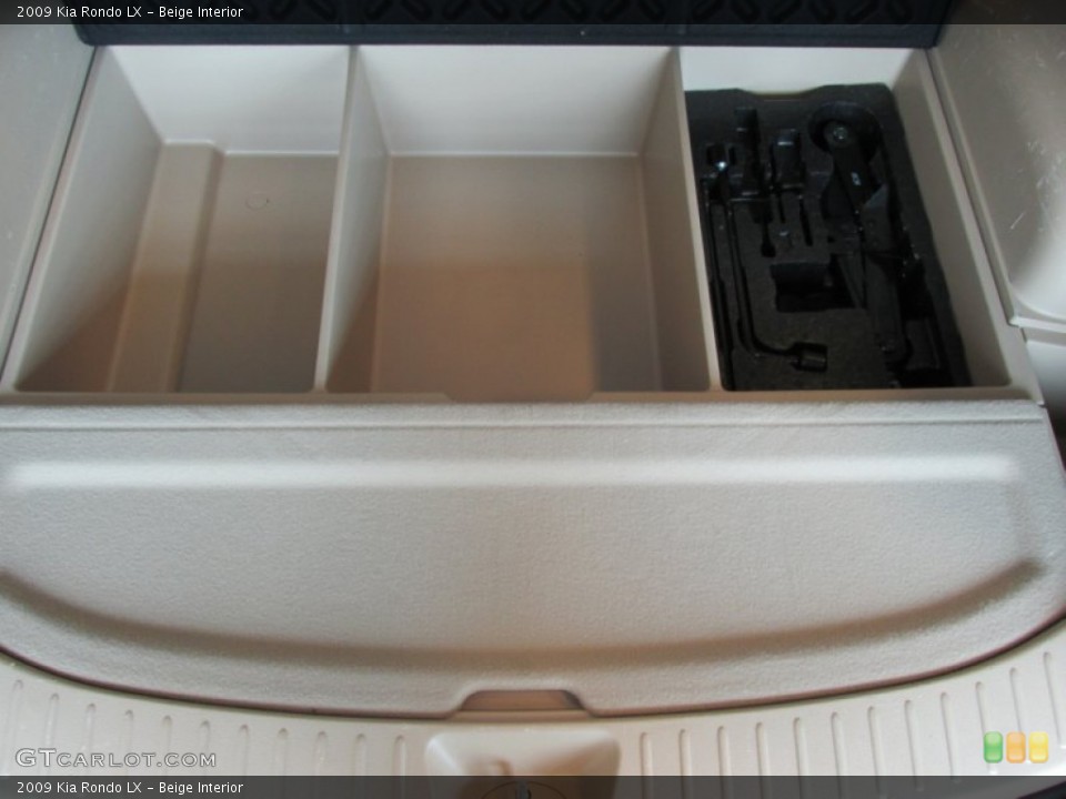 Beige Interior Trunk for the 2009 Kia Rondo LX #81563652