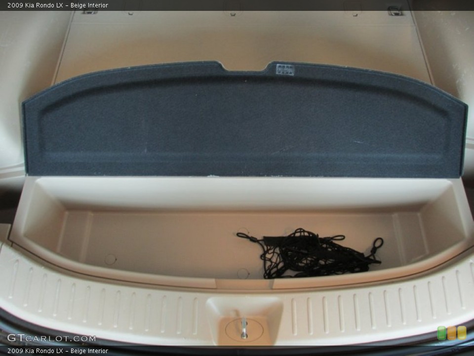 Beige Interior Trunk for the 2009 Kia Rondo LX #81563670