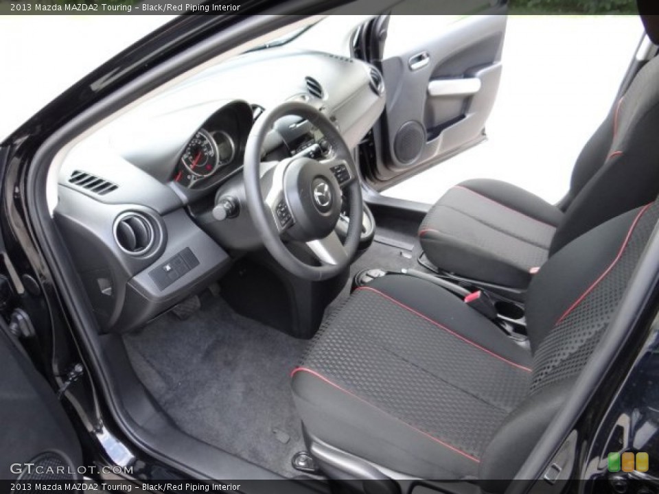 Black/Red Piping Interior Photo for the 2013 Mazda MAZDA2 Touring #81572238