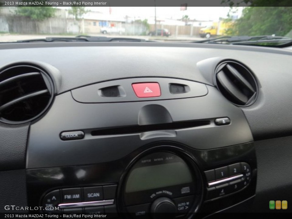 Black/Red Piping Interior Audio System for the 2013 Mazda MAZDA2 Touring #81572337
