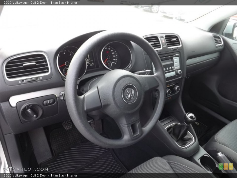 Titan Black Interior Dashboard for the 2010 Volkswagen Golf 2 Door #81581922
