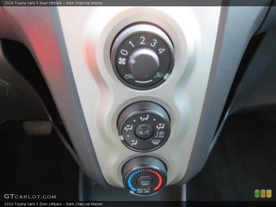 Dark Charcoal Interior Controls for the 2010 Toyota Yaris 3 Door Liftback #81627747