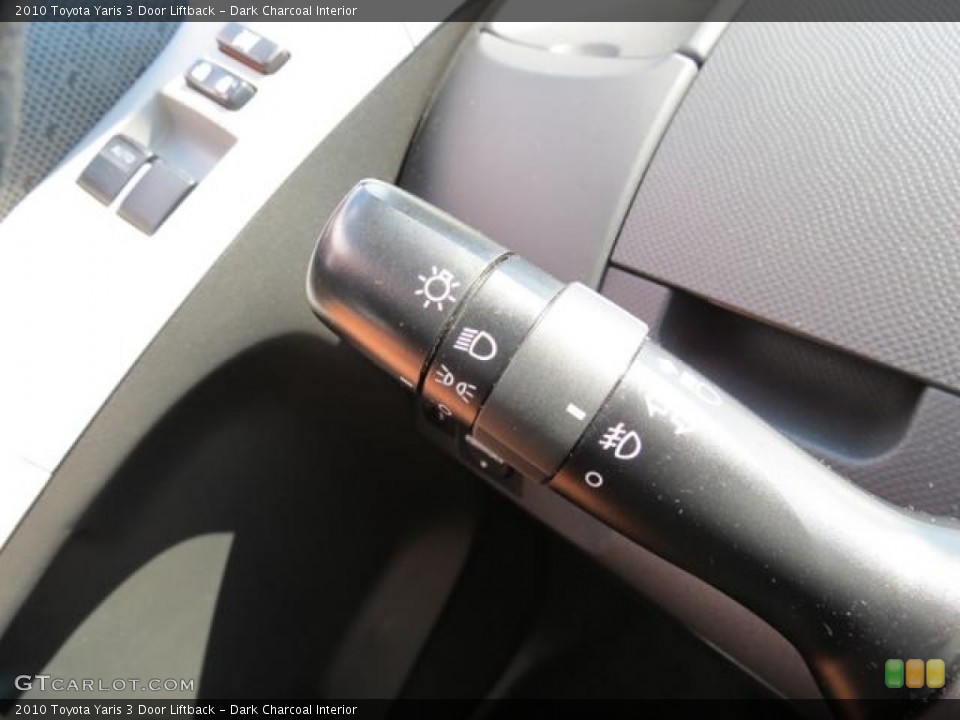 Dark Charcoal Interior Controls for the 2010 Toyota Yaris 3 Door Liftback #81627783