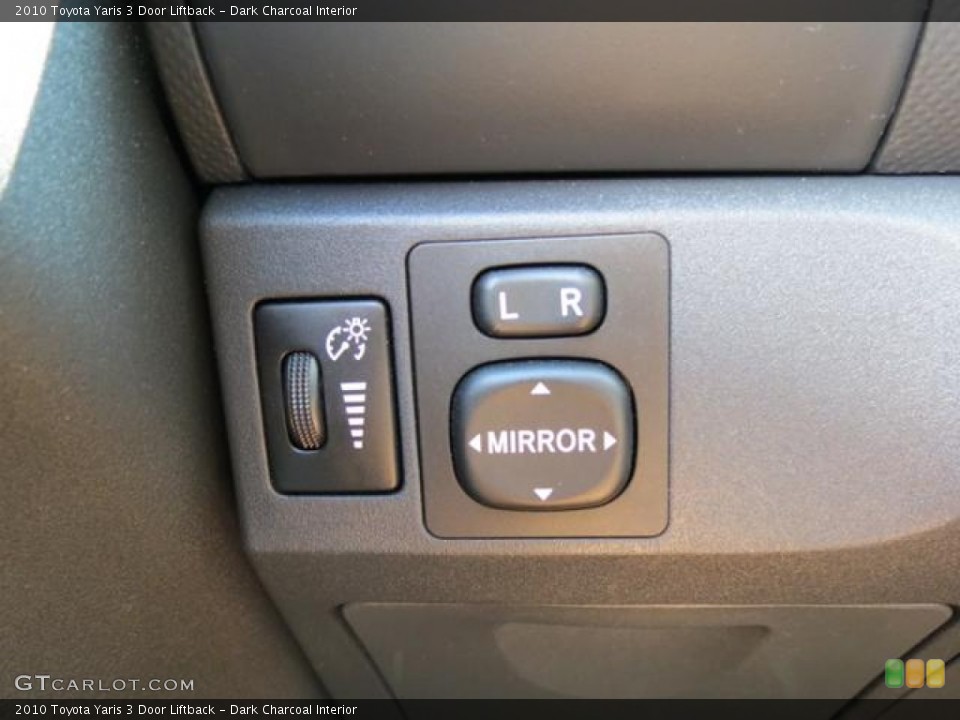 Dark Charcoal Interior Controls for the 2010 Toyota Yaris 3 Door Liftback #81627801