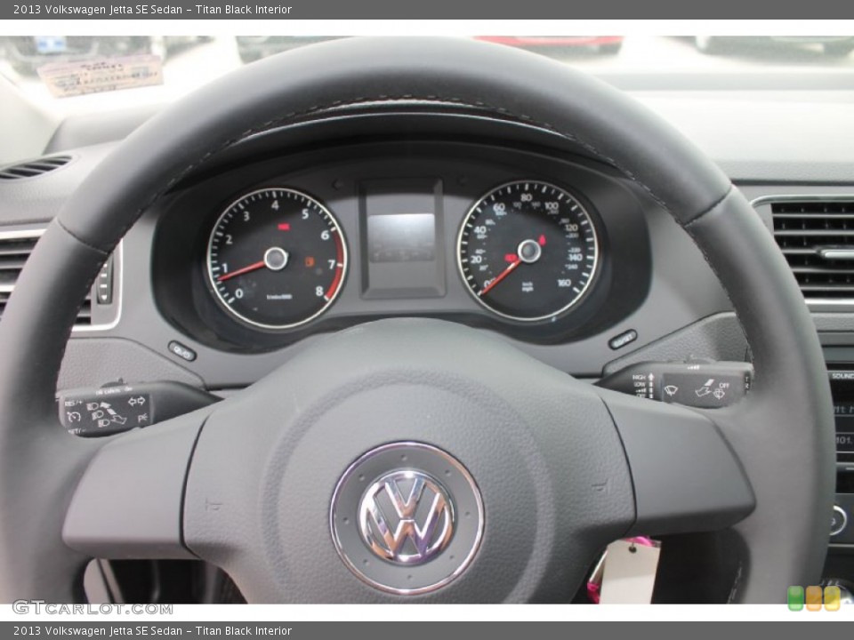 Titan Black Interior Steering Wheel for the 2013 Volkswagen Jetta SE Sedan #81628692
