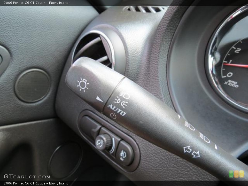 Ebony Interior Controls for the 2006 Pontiac G6 GT Coupe #81629049