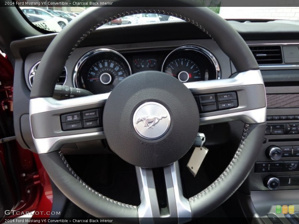 Charcoal Black Interior Steering Wheel for the 2014 Ford Mustang V6 Convertible #81636469