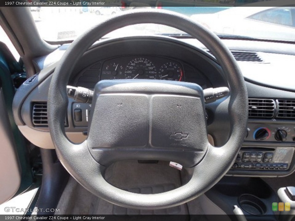 Light Gray Interior Steering Wheel for the 1997 Chevrolet Cavalier Z24 Coupe #81686767