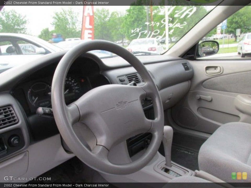 Dark Charcoal Interior Steering Wheel for the 2002 Chevrolet Prizm  #81726509