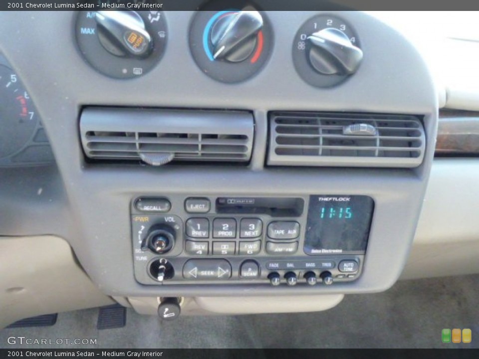 Medium Gray Interior Controls for the 2001 Chevrolet Lumina Sedan #81735466