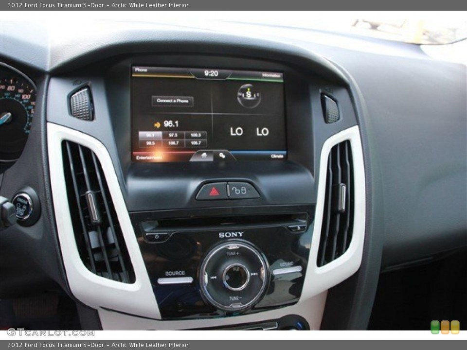 Arctic White Leather Interior Controls for the 2012 Ford Focus Titanium 5-Door #81771740